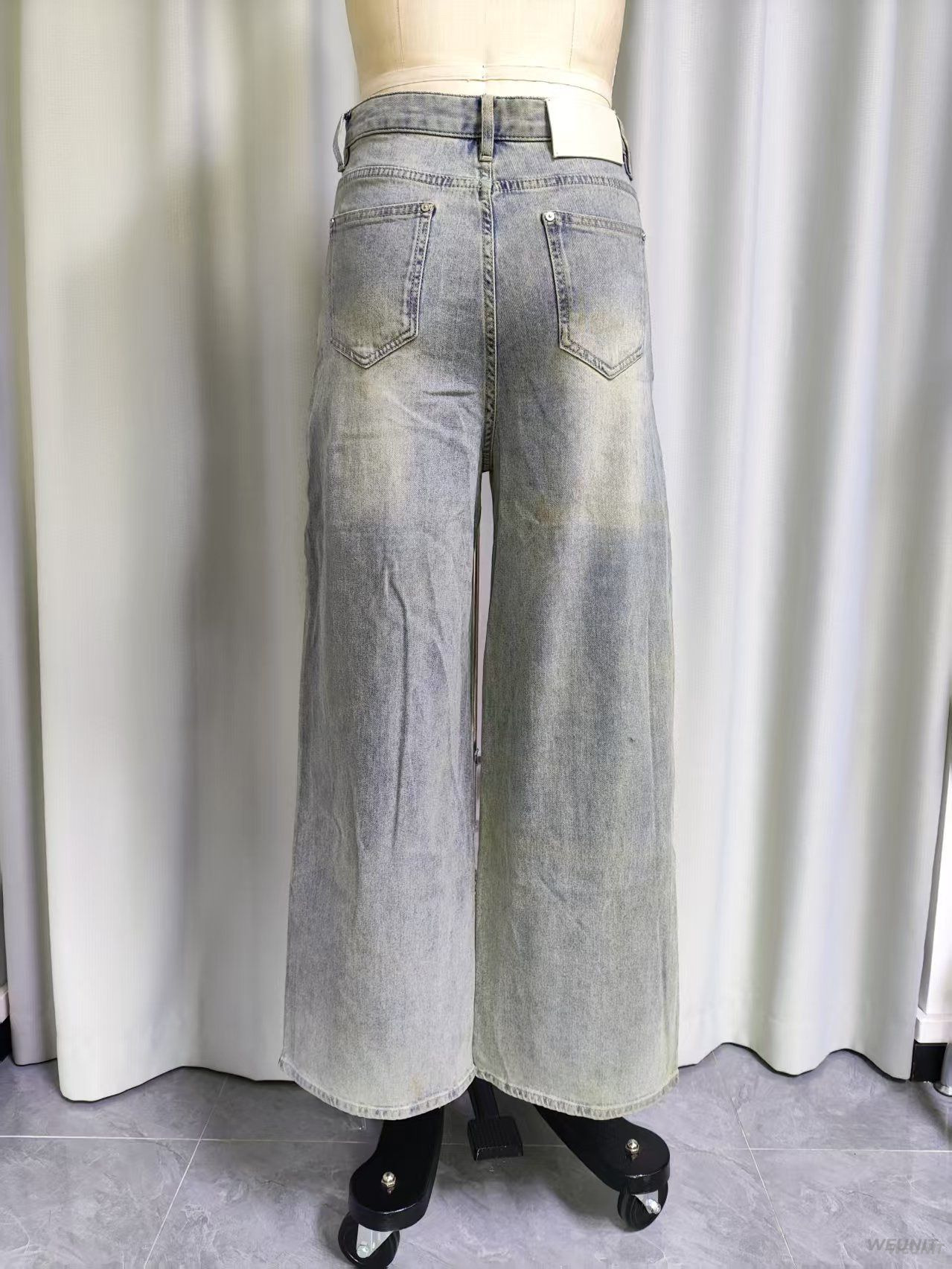 High-Waisted Wide-Leg Distressed Denim Jeans